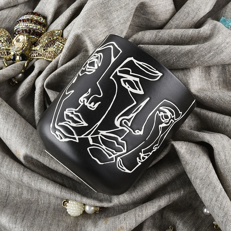 white ceramic candle jars with various sizes