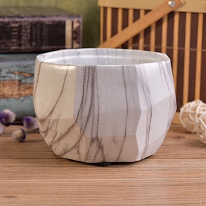 Polygon vintage concrete candle holders table use