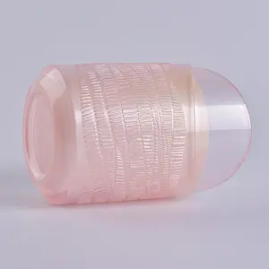 translucent pink glass candle holder in heart shape