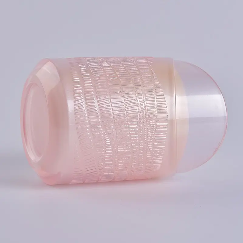 translucent pink glass candle holder in heart shape
