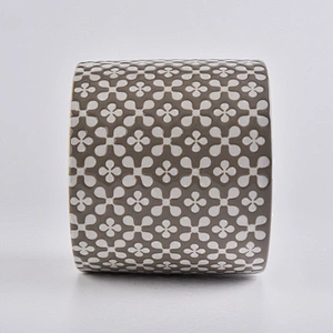 brown ceramic candle holder, round ceramic vessel with patterns