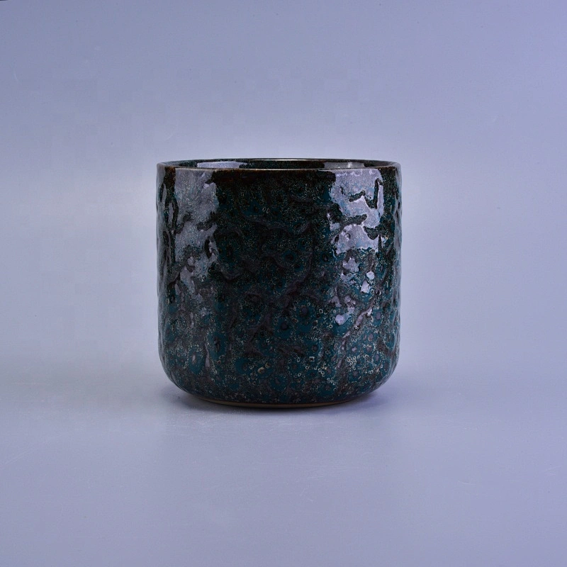 Cylinder embossed ceramic tea light candle vessel in bulk