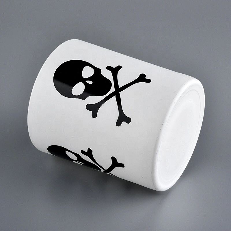 skull pattern on matter color glass candle jars