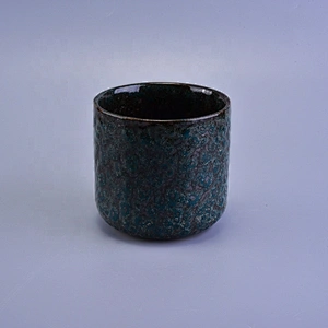 Cylinder embossed ceramic tea light candle vessel in bulk