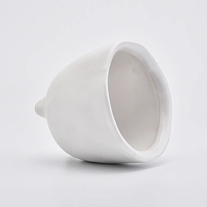 Footed matte white ceramic vessel candle jars in bulk