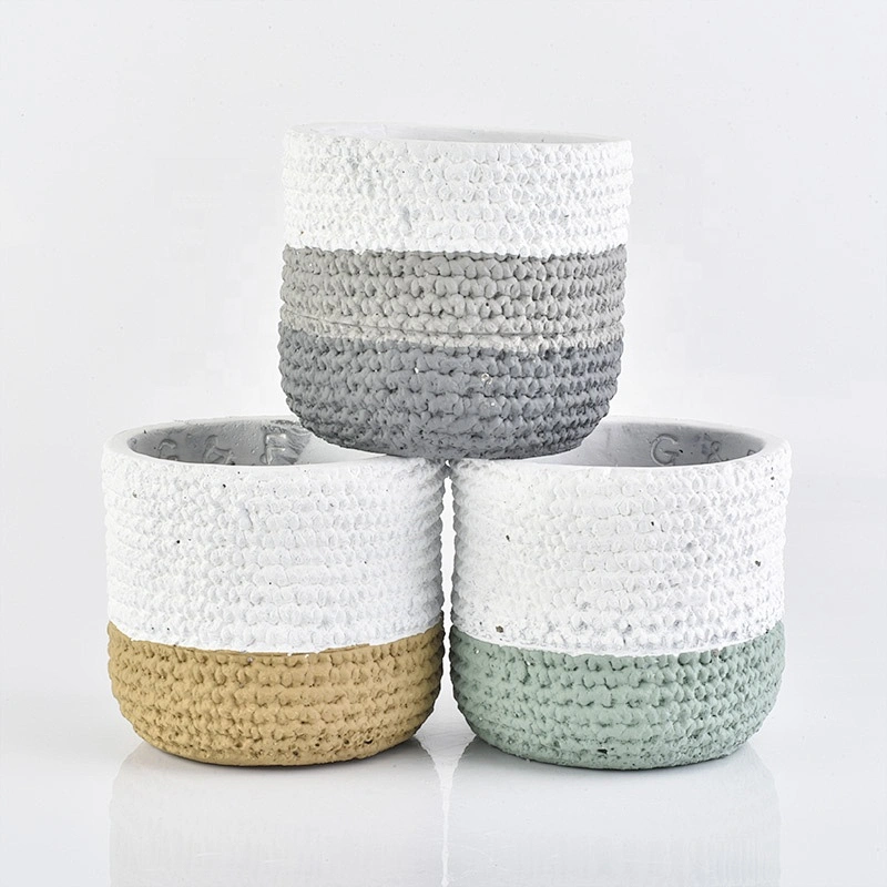Matte white amber concrete candle jars with woven designs