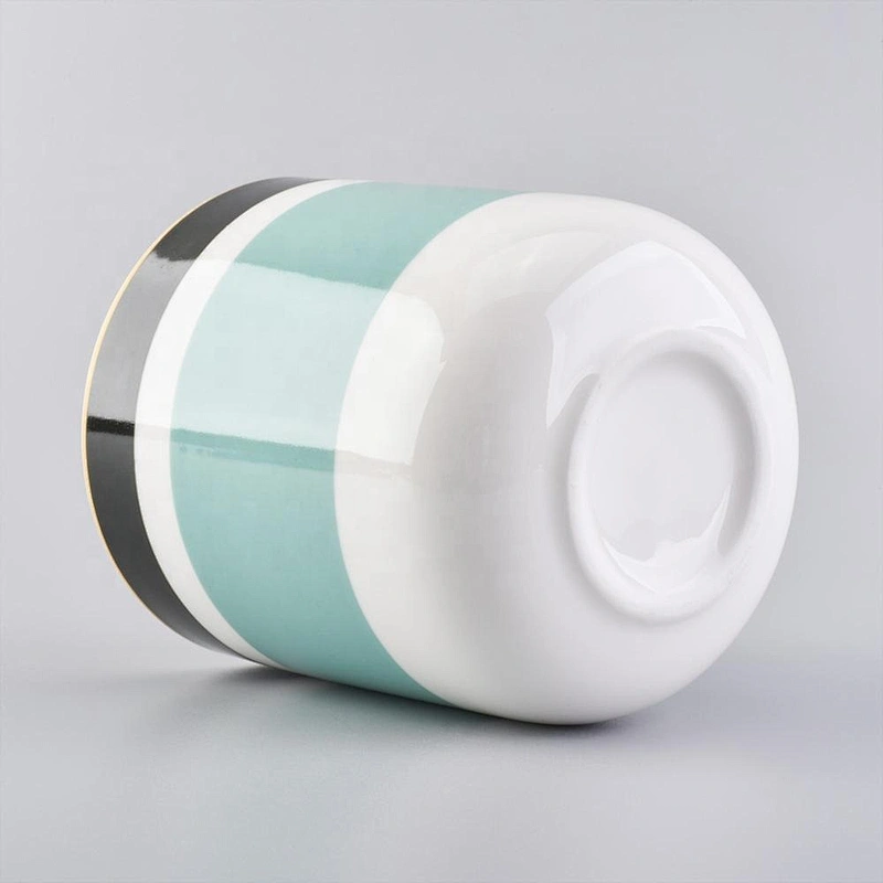 glossy ceramic candle jars with colorful stripes