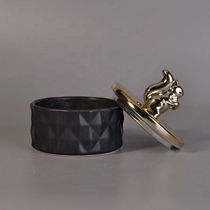 Unique black ceramic candle holder with gold lid for home decor