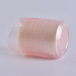 translucent pink glass candle holder in heart shape