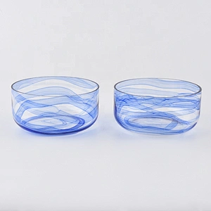 wide glass jars with marble decoration