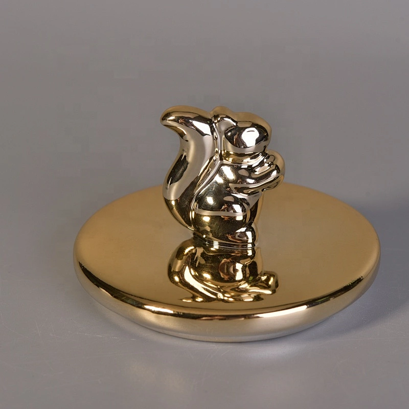 Unique black ceramic candle holder with gold lid for home decor