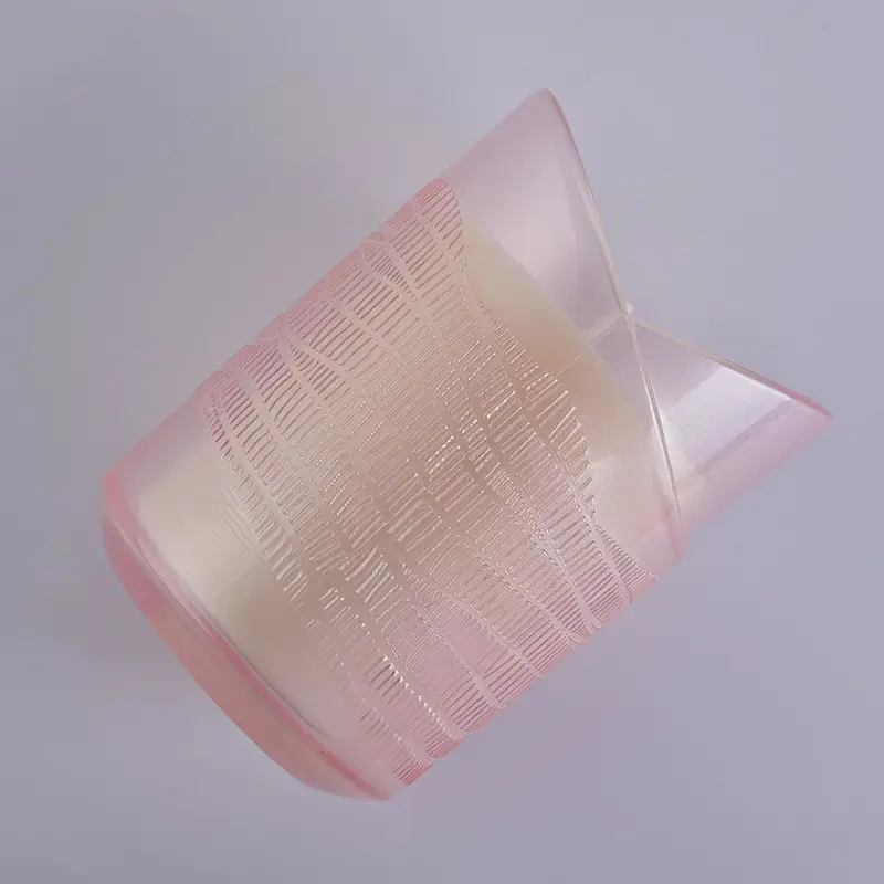 translucent pink glass candle holder in heart shape