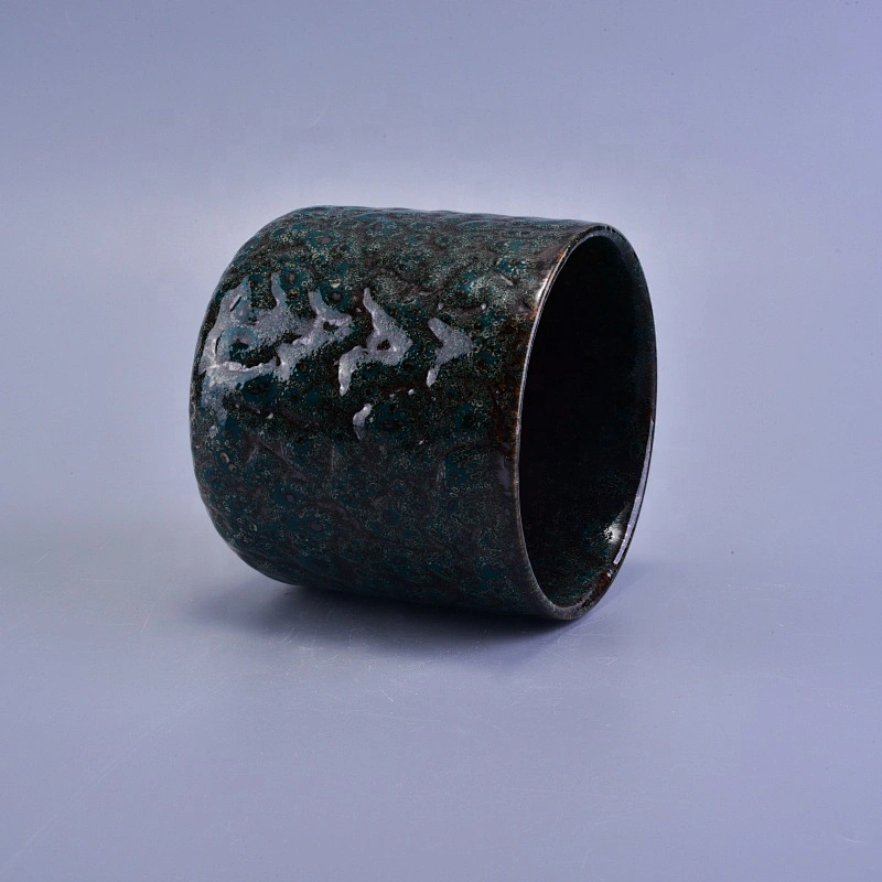Cylinder embossed ceramic tea light candle vessel in bulk