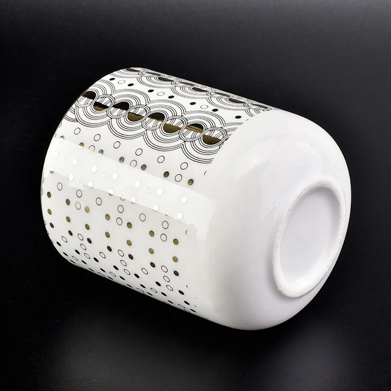glossy white ceramic candle jars with gold printing