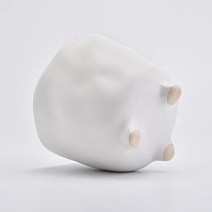 Footed matte white ceramic vessel candle jars in bulk