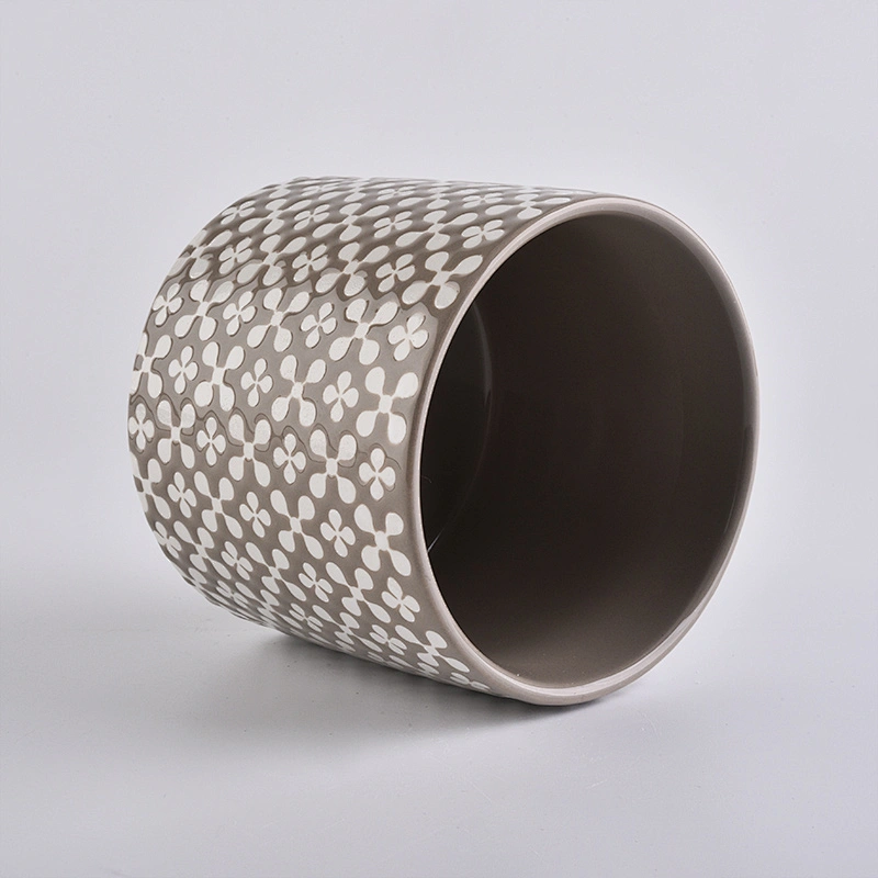 brown ceramic candle holder, round ceramic vessel with patterns