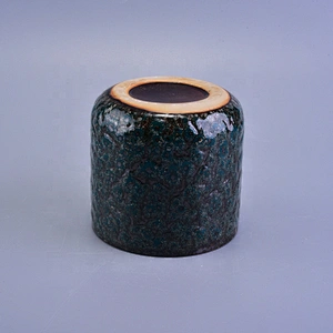 Cylinder embossed ceramic tea light candle vessel in bulk