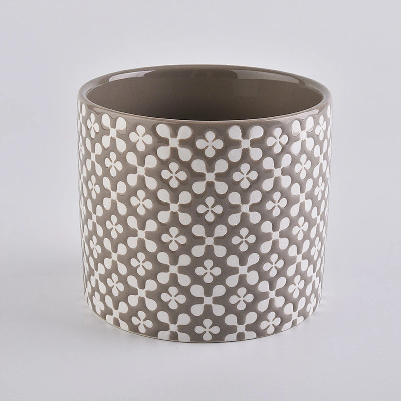 brown ceramic candle holder, round ceramic vessel with patterns