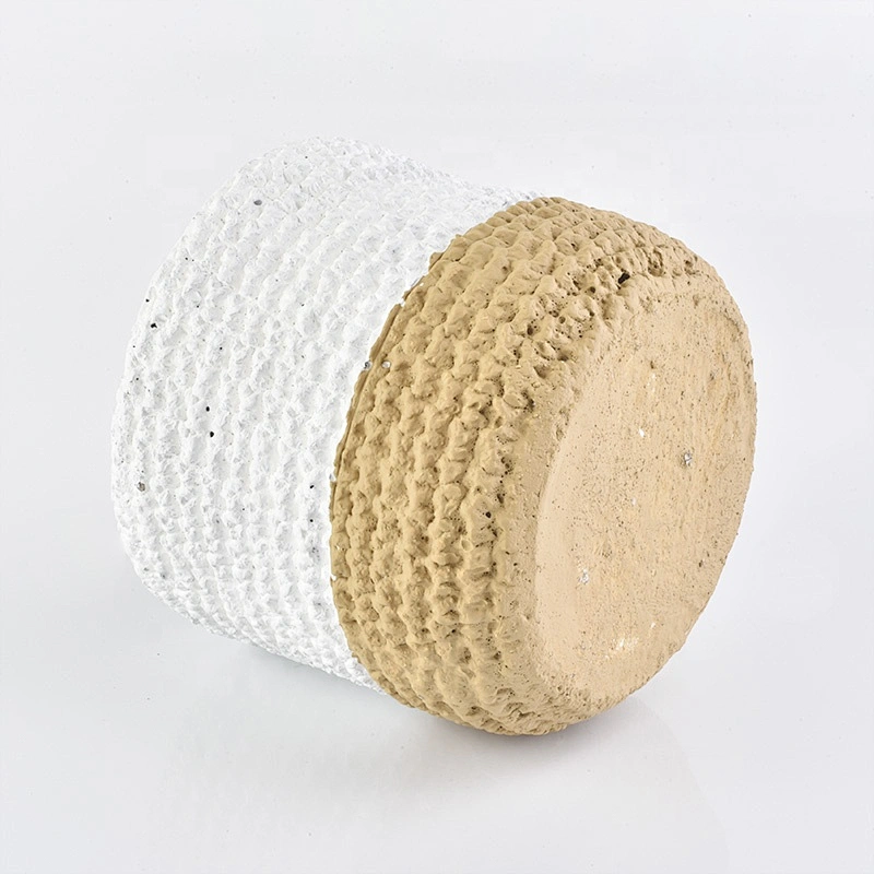 Matte white amber concrete candle jars with woven designs