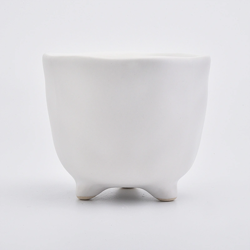Footed matte white ceramic vessel candle jars in bulk