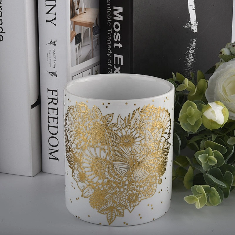 white ceramic candle jars with gold printing for Christmas
