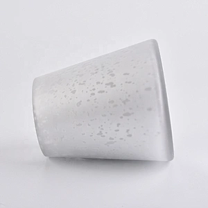 Large white glass candle vessels with mercury decorations