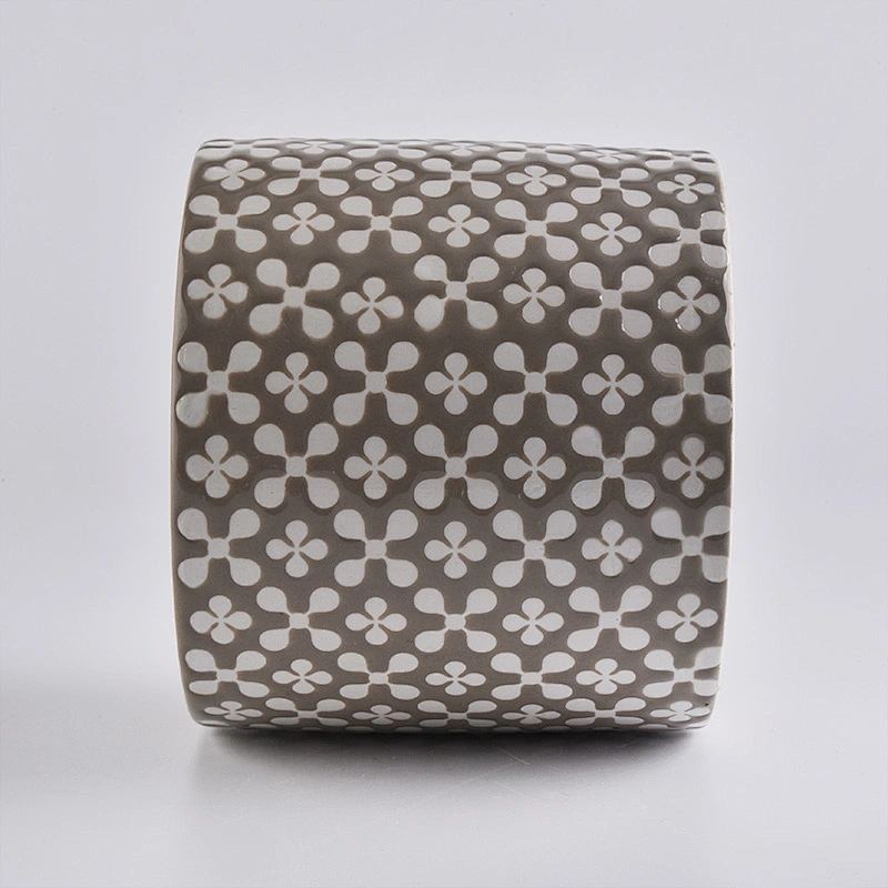 brown ceramic candle holder, round ceramic vessel with patterns