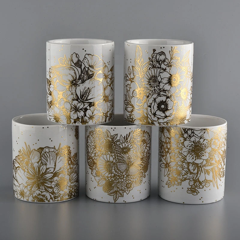 white ceramic candle jars with gold printing for Christmas