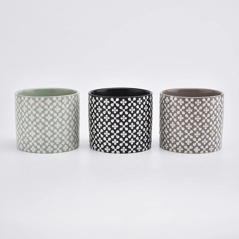black round ceramic candle vessel with decorative pattern, cylinder ceramic candle holders