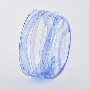 wide glass jars with marble decoration