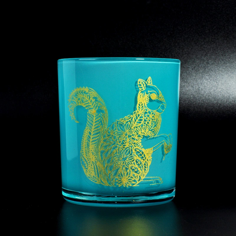 blue cylinder glass candle container with gold decal, votive candle holder