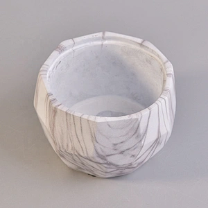 Polygon vintage concrete candle holders table use