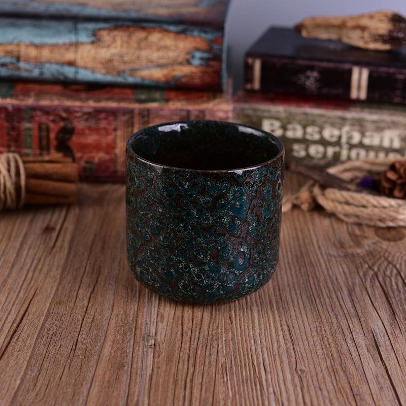 Cylinder embossed ceramic tea light candle vessel in bulk
