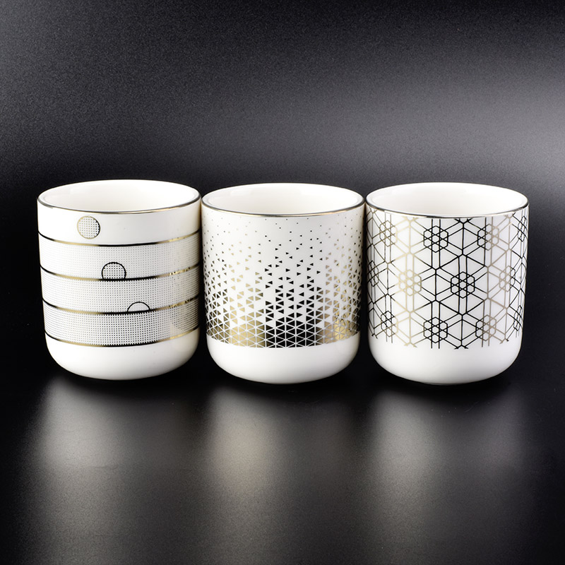 glossy white ceramic candle jars with gold printing