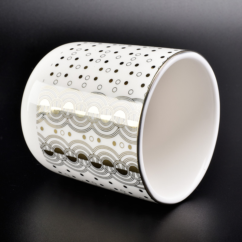 glossy white ceramic candle jars with gold printing
