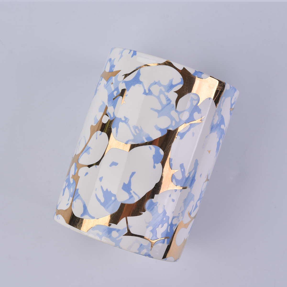 straight ceramic candle jars wtih gold marble patterns