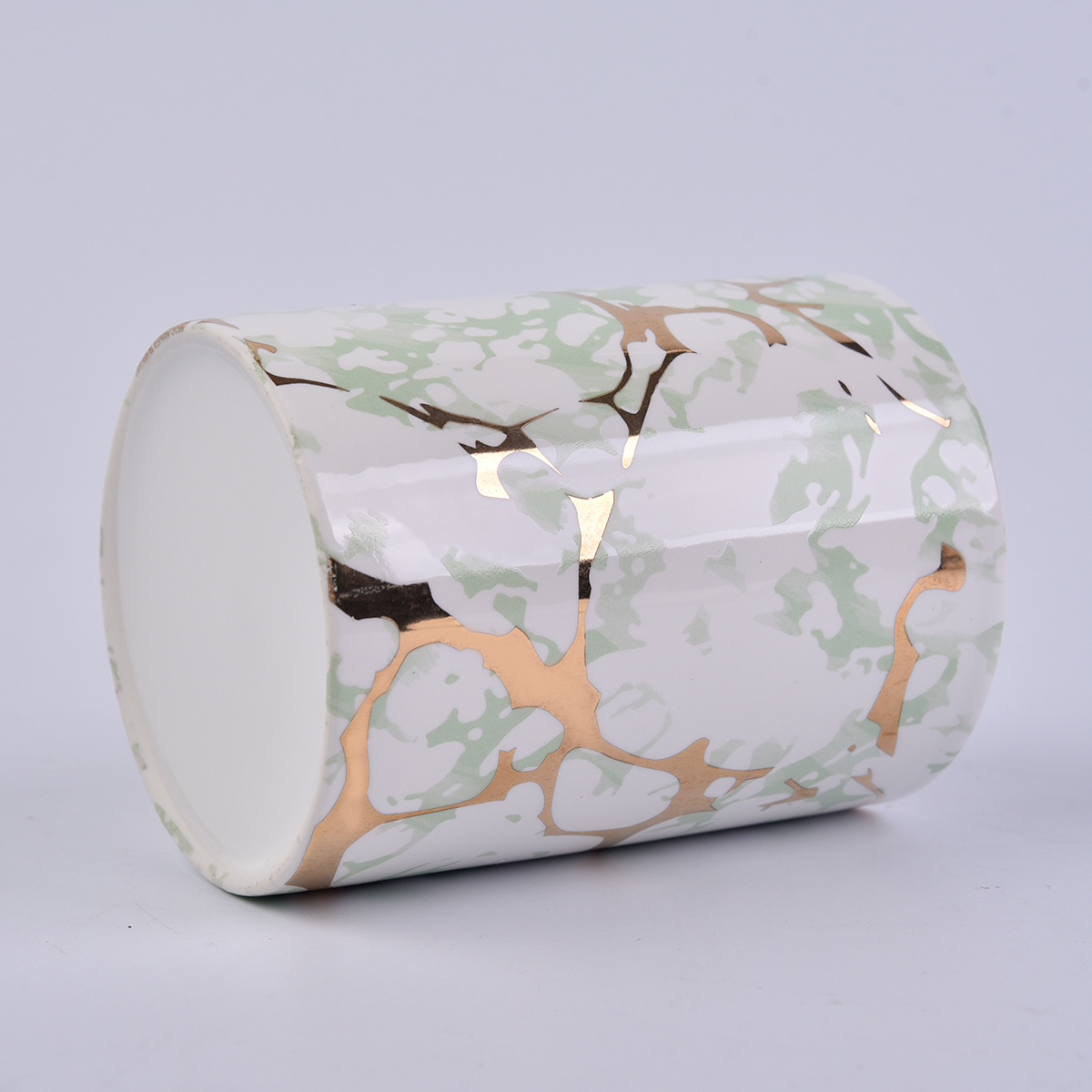 straight ceramic candle jars wtih gold marble patterns