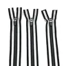 Reflective reversible zipper