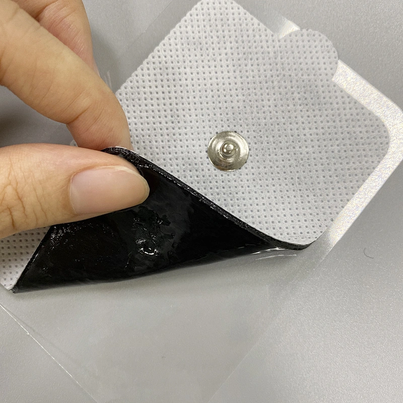 Non-woven Gray Snap TENS Pads EMS Self-adhesive Electrode Replacement Pads with Ear
