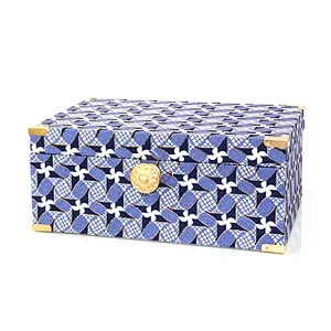 Blue fabric covered wooden jewelry box with knobs