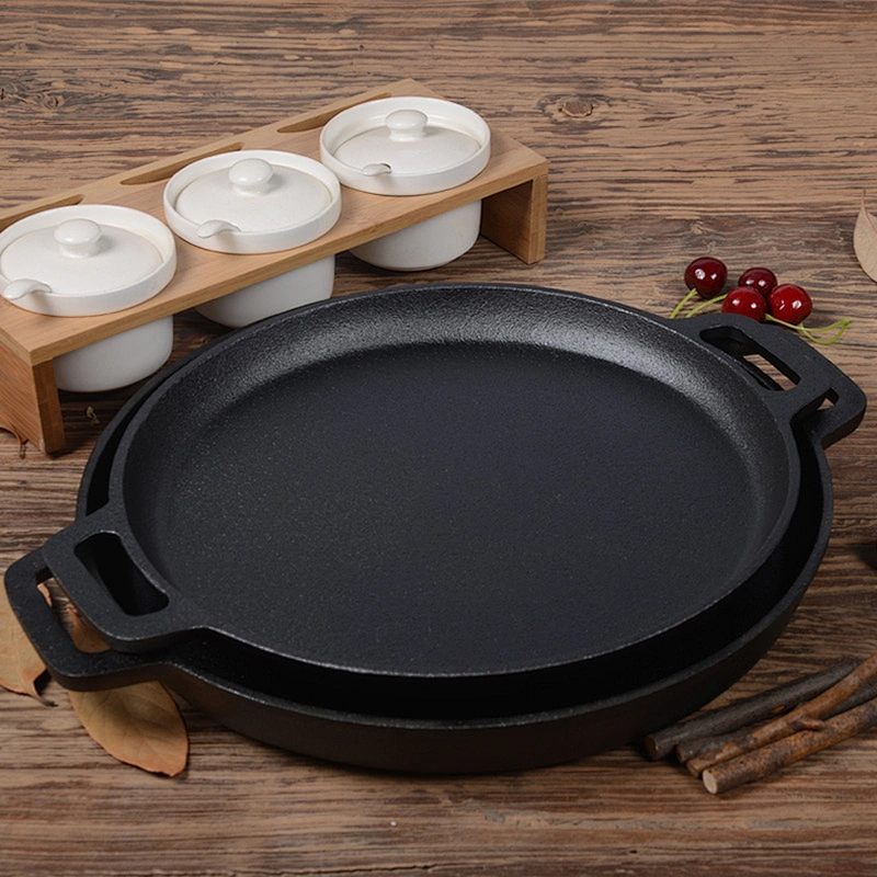 Wholesale professional universal household round black cast iron preseasoned fry pan non stick with two side handles