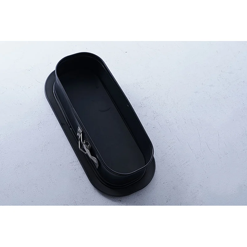 Hot sale accept custom brand black oval small carbon steel non stick coating bake tools mousse cake mold