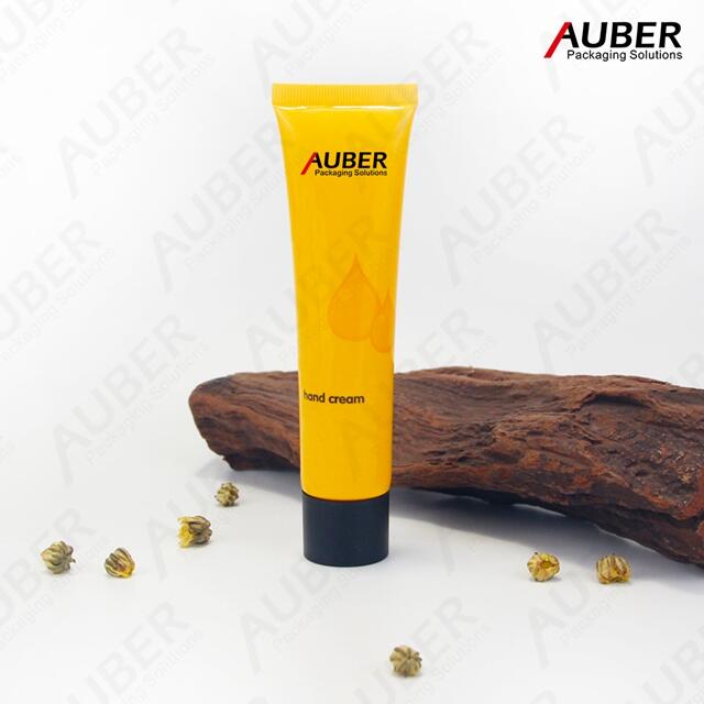 Yellow water drop PE tube with black screw on cap