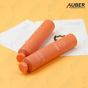 Matte orange PE tubes with octagonal screw caps