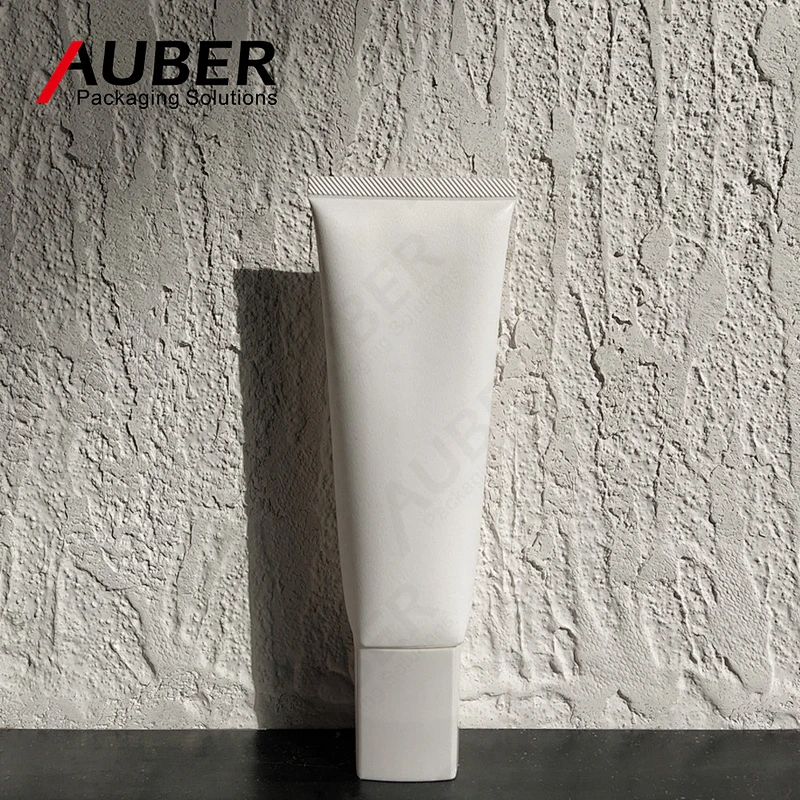 White square plastic squeeze tube