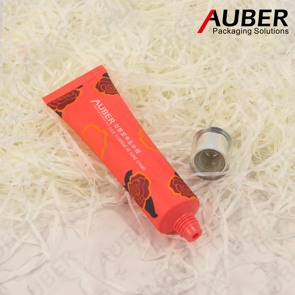 Red rose plastic squeeze tube with acrylic cap
