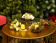 Glass candle holder with decoration