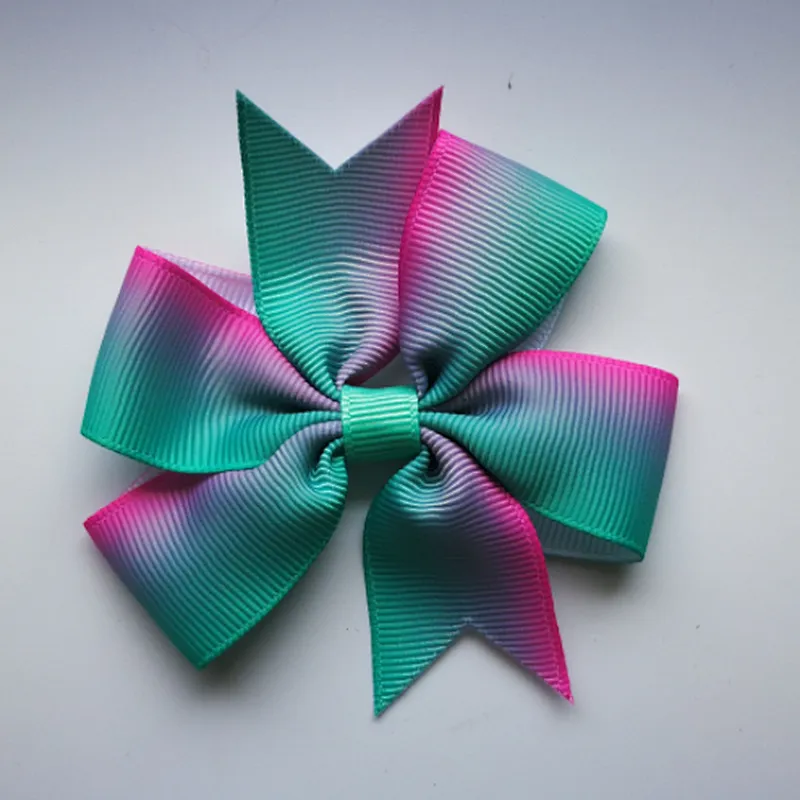 Hot selling printing gradient rainbow stripes fishtail bow hairpin children's hair accessories