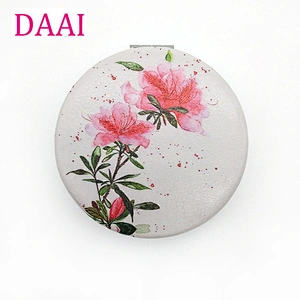 Dongguan factory custom round double sided flower pattern plastic frame pocket mirror for lady gift