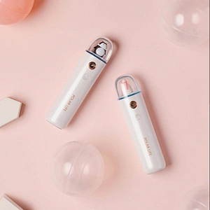 Lovely shape couple style nano spray delicate and refreshing mini spray water replenishing instrument